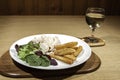 Healthy low calorie chicken meal with salad and wine Royalty Free Stock Photo